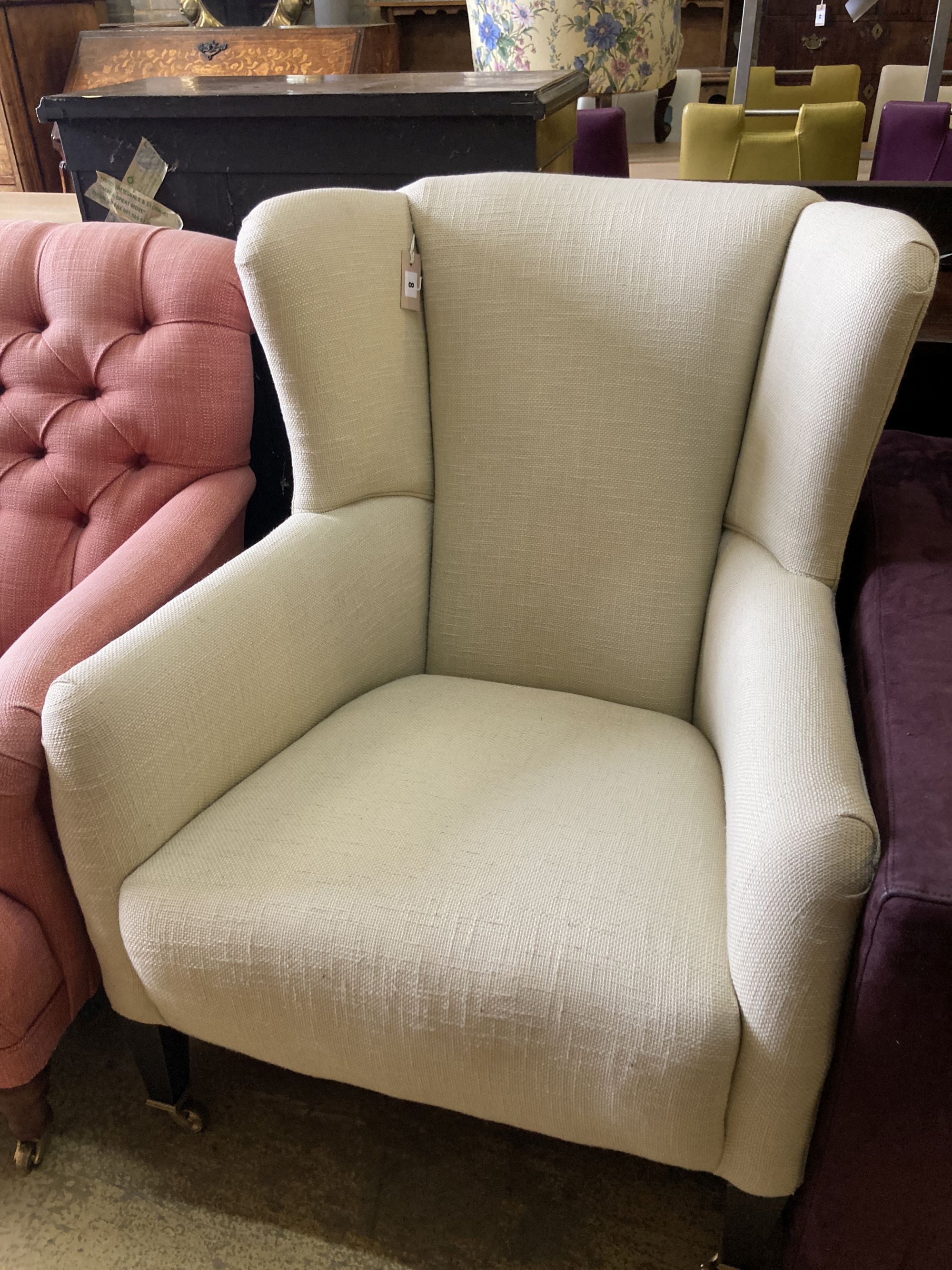 A contemporary upholstered armchair, width 68cm, depth 80cm, height 96cm